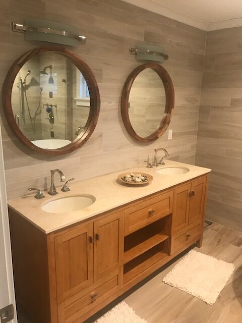 Wood double vanity with round mirrors