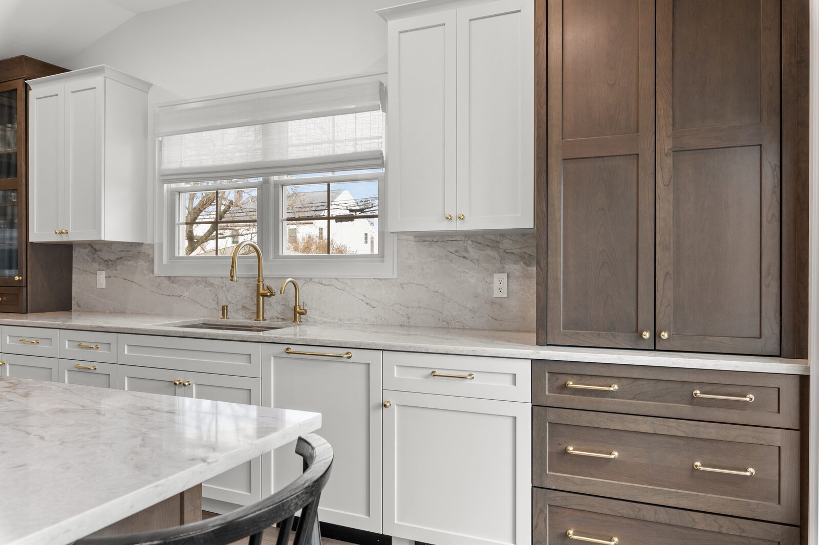 Renovated kitchen with custom cabinetry, view 017