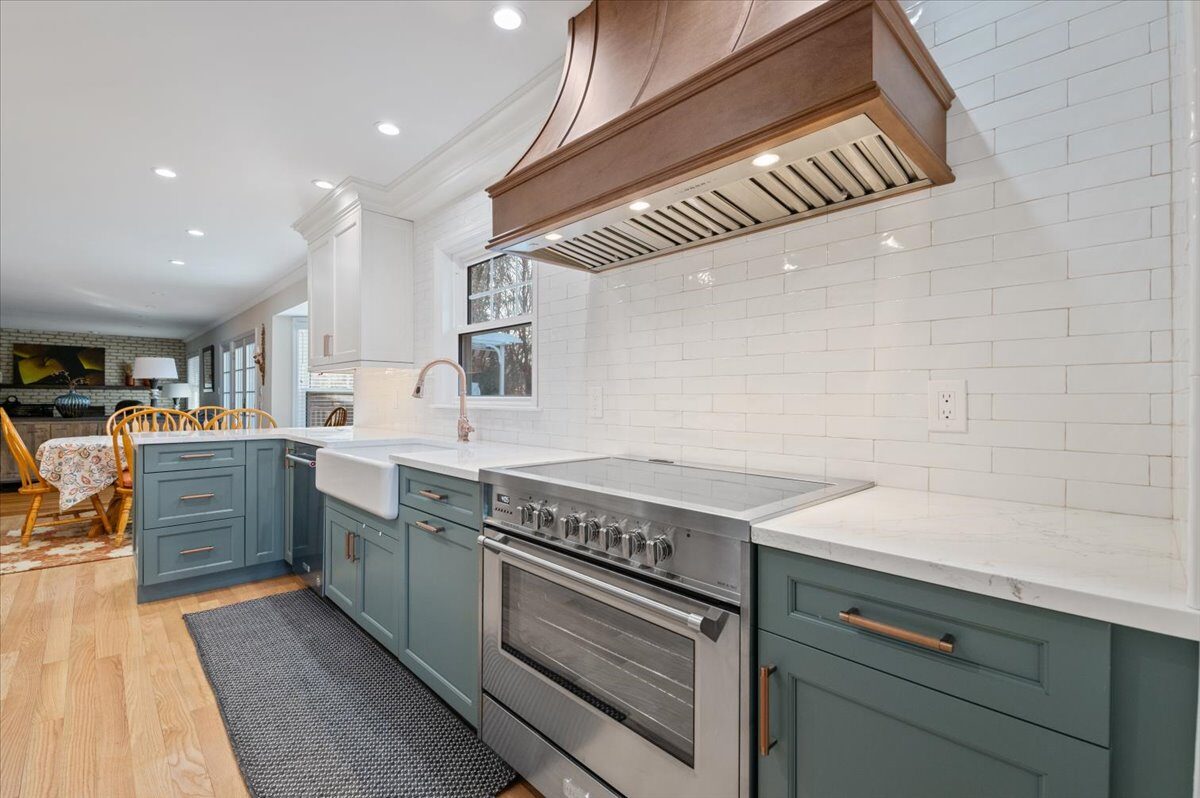 Renovated kitchen with custom cabinetry, view 019