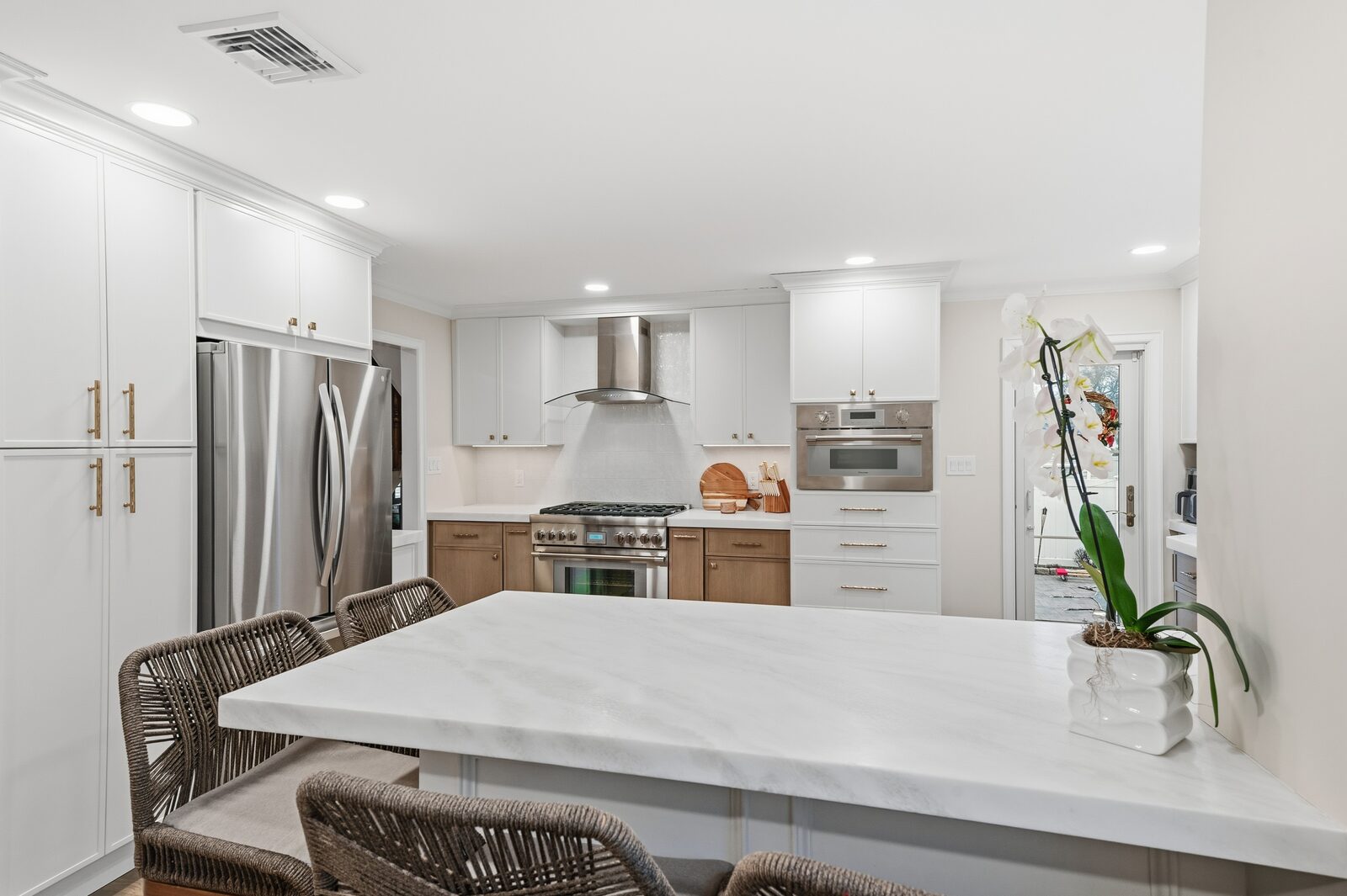 Renovated kitchen with custom cabinetry, view 026