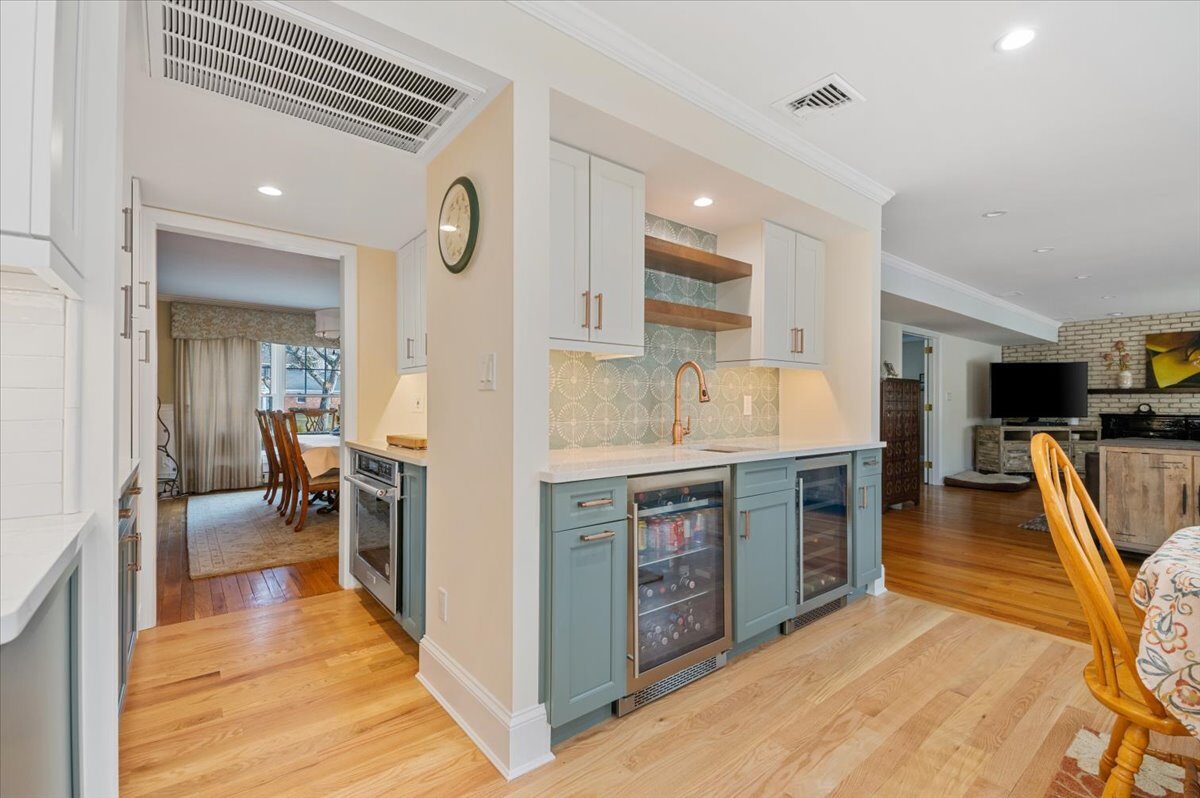 Renovated kitchen with custom cabinetry, view 034