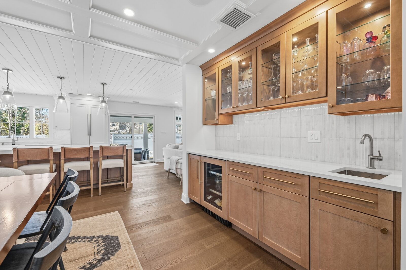 Renovated kitchen with custom cabinetry, view 044
