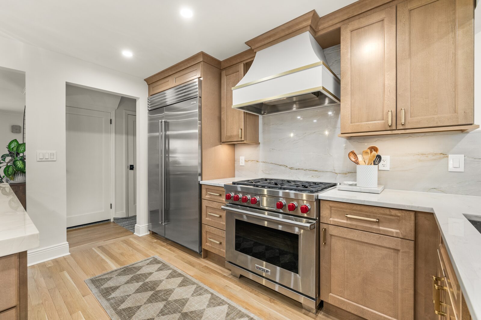 Renovated kitchen with custom cabinetry, view 047