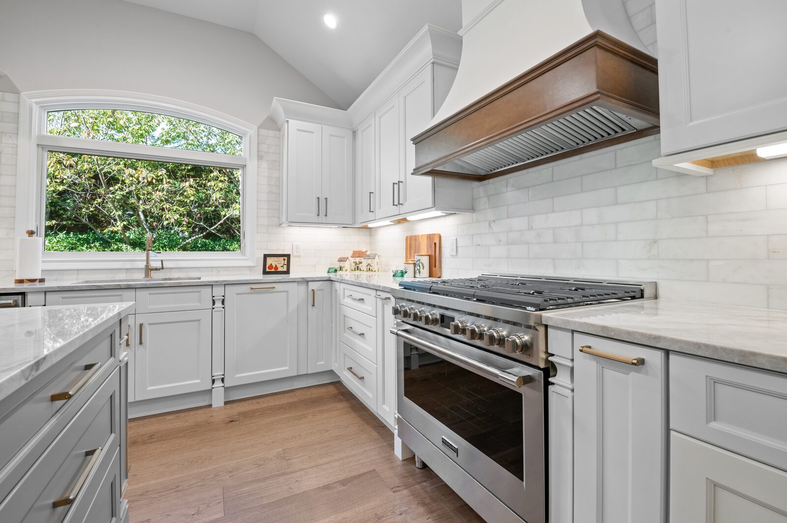 Renovated kitchen with custom cabinetry, view 059