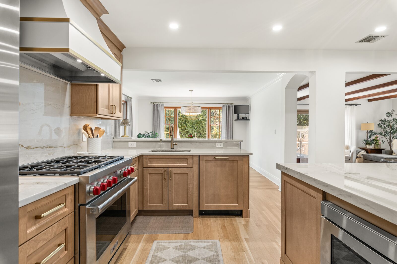 Renovated kitchen with custom cabinetry, view 062