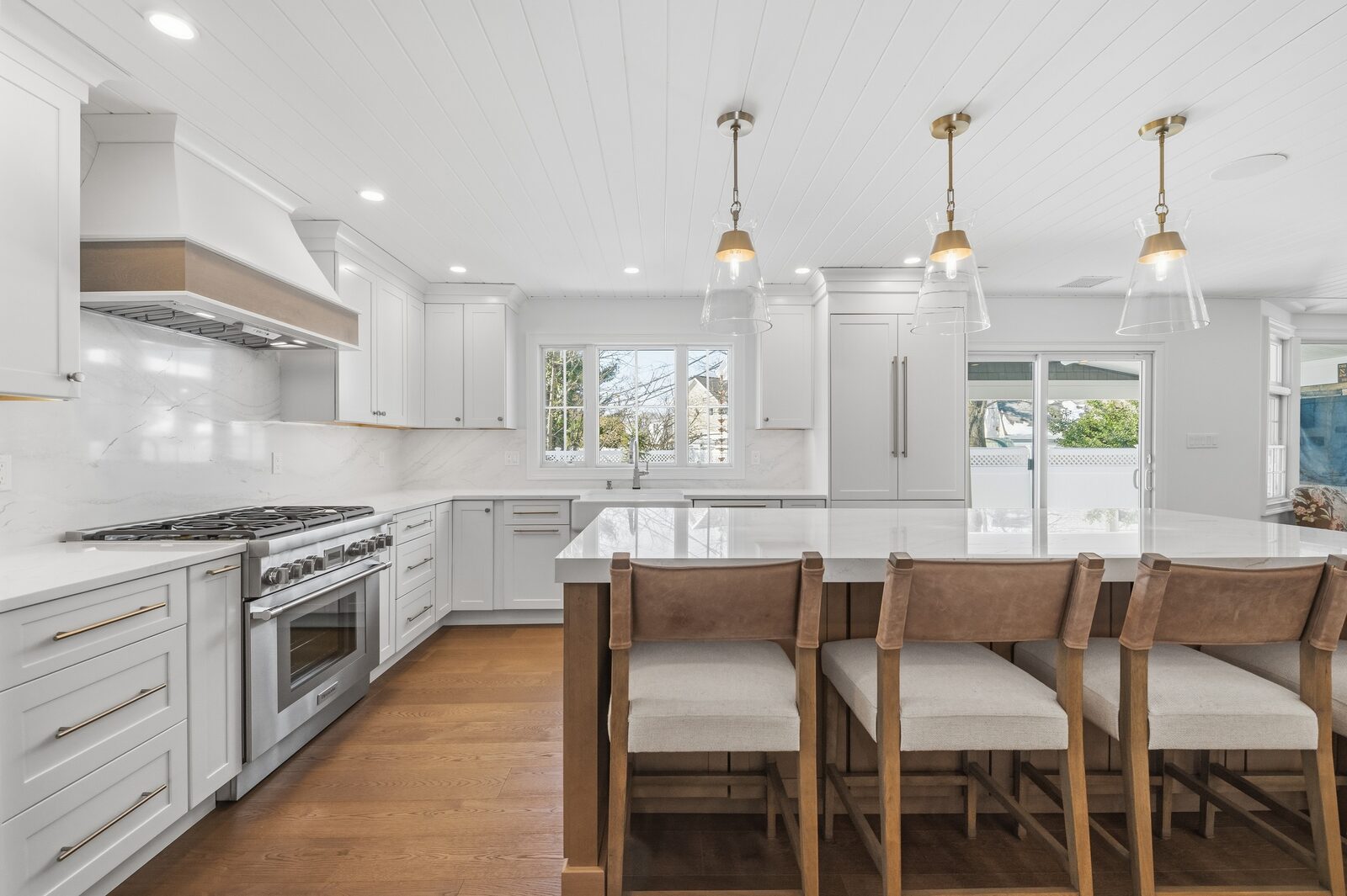 Renovated kitchen with custom cabinetry, view 075