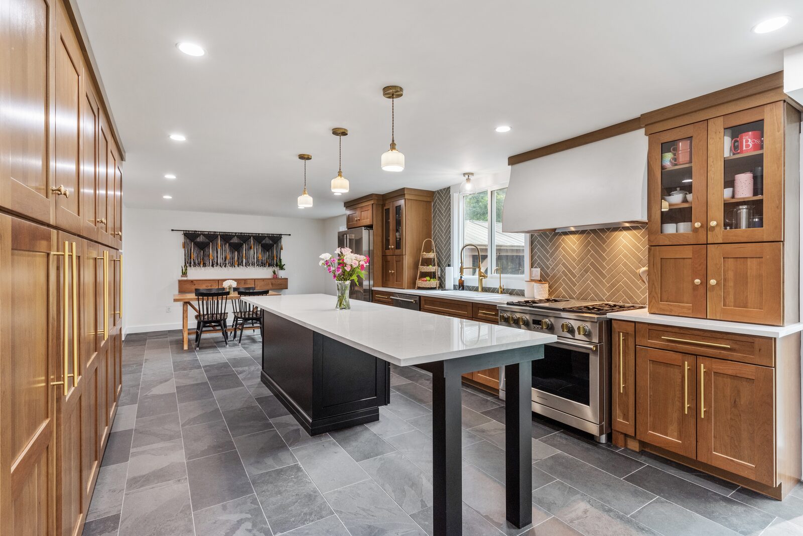 Renovated kitchen with custom cabinetry, view 095