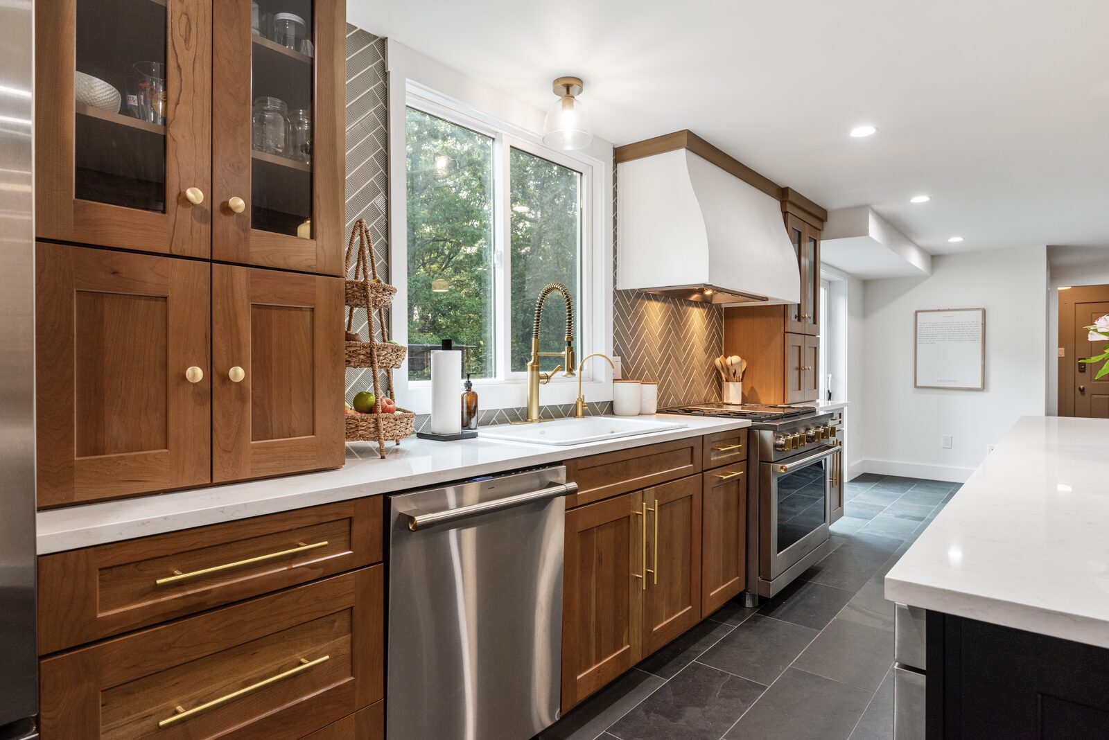 Renovated kitchen with custom cabinetry, view 098